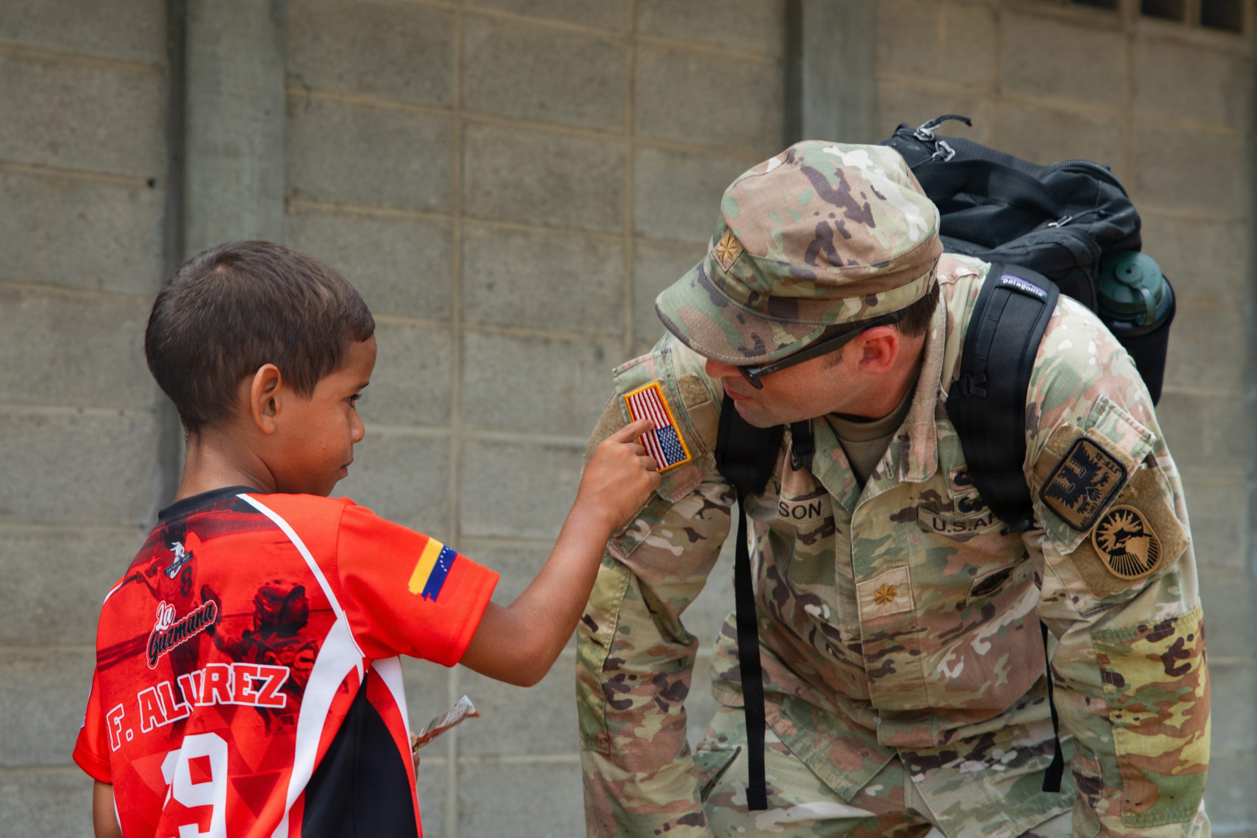 Service member representing strength through community